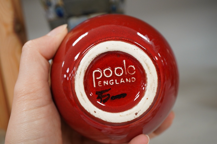 A Royal Doulton pottery vase and a Poole pottery Delphis vase, tallest 20.5cm